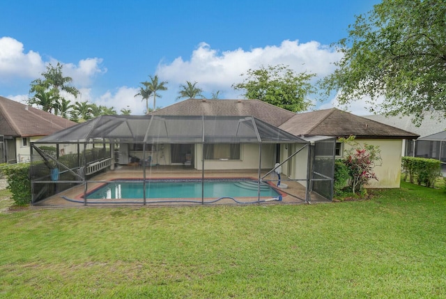 18356 181st Cir S, Boca Raton, FL 33498 - back of house featuring an outdoor pool, stucco siding, glass enclosure, and a lawn