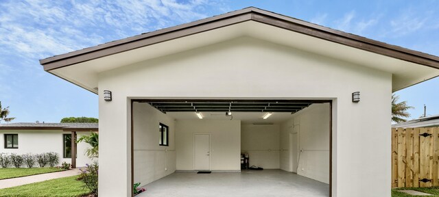 garage featuring fence