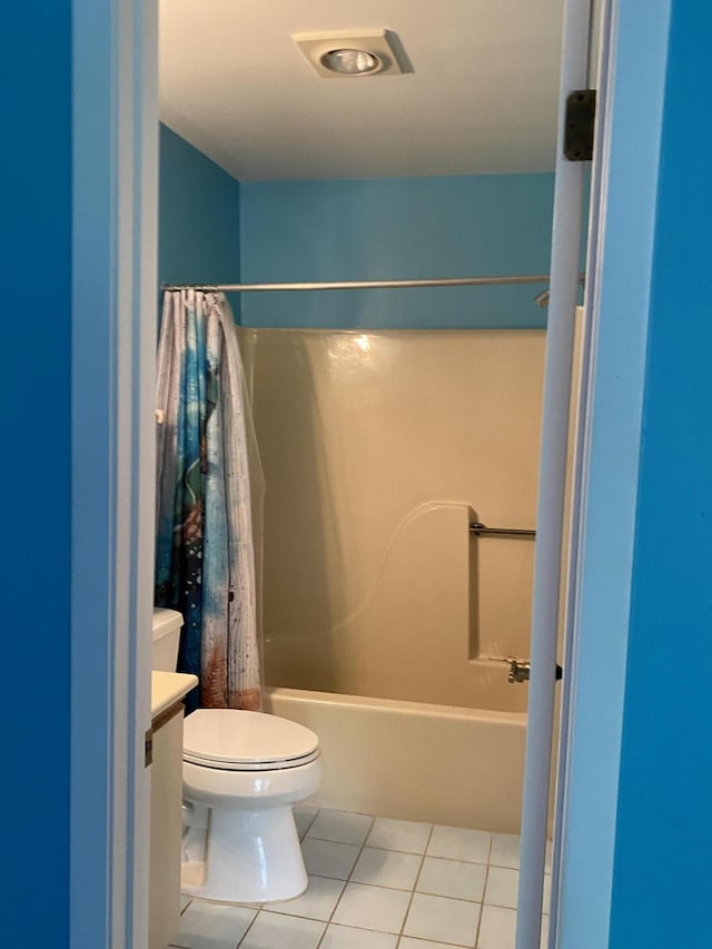 10501 SE Croft Ct Unit D-8, Hobe Sound, FL 33455 - full bathroom with toilet, shower / bath combo, tile patterned flooring, and vanity