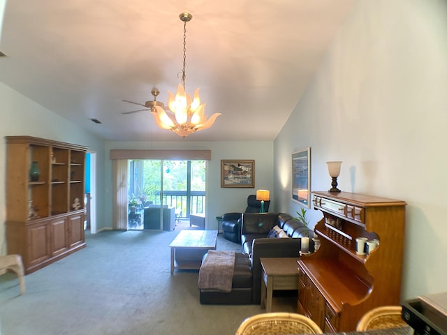 10501 SE Croft Ct Unit D-8, Hobe Sound, FL 33455 - living area with carpet floors, a chandelier, and vaulted ceiling