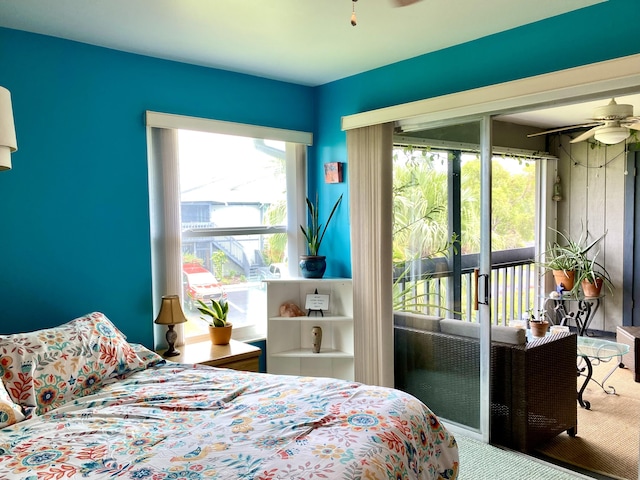 10501 SE Croft Ct Unit D-8, Hobe Sound, FL 33455 - carpeted bedroom with access to outside
