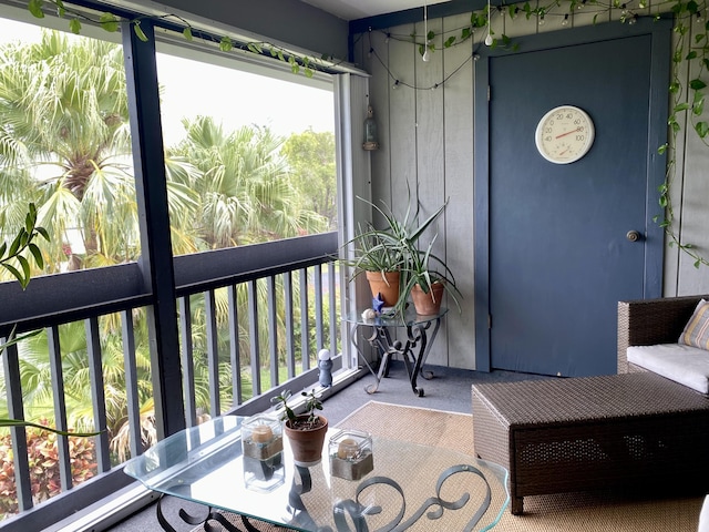10501 SE Croft Ct Unit D-8, Hobe Sound, FL 33455 - sunroom featuring outdoor dining space