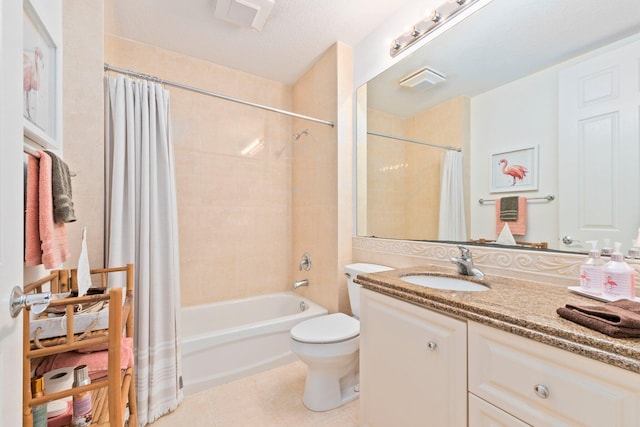 bathroom with vanity, shower / bath combo with shower curtain, toilet, tile patterned flooring, and visible vents