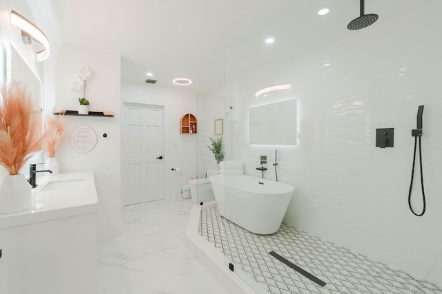 16250 SW 274th St, Homestead, FL 33031 - full bathroom with marble finish flooring, walk in shower, double vanity, a freestanding tub, and recessed lighting