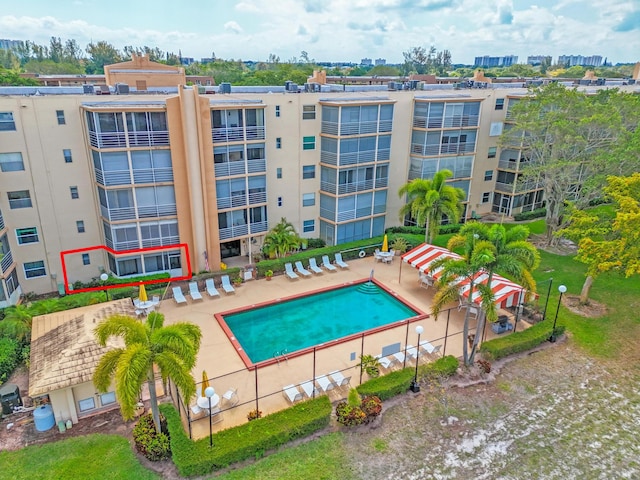 community pool with a patio