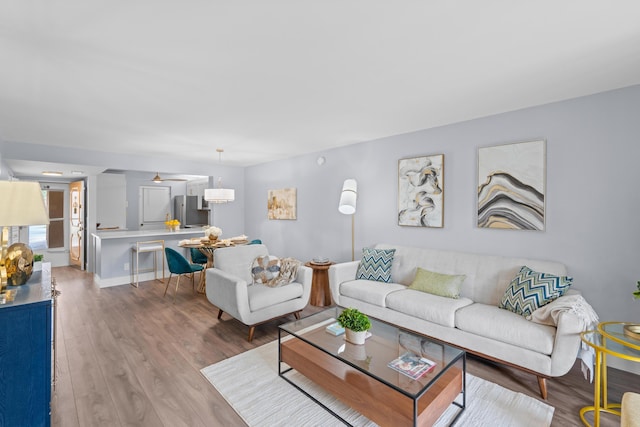 living area with wood finished floors