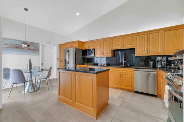 kitchen with a sink, a center island, decorative backsplash, appliances with stainless steel finishes, and high vaulted ceiling