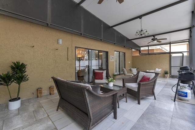 view of patio featuring area for grilling, ceiling fan, and an outdoor hangout area