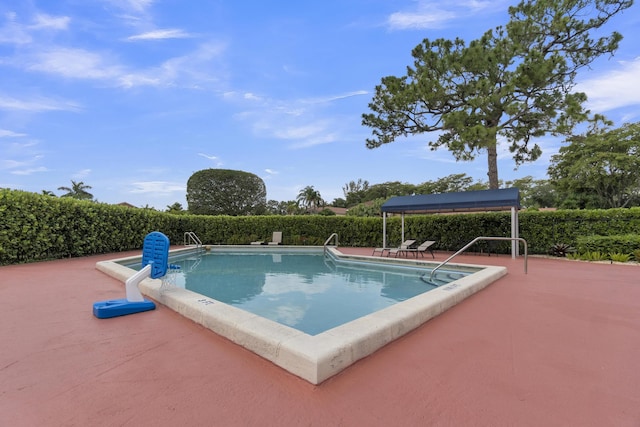 community pool with a gazebo