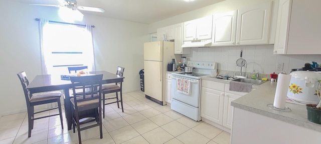 kitchen featuring a sink, ceiling fan, white appliances, under cabinet range hood, and white cabinetry