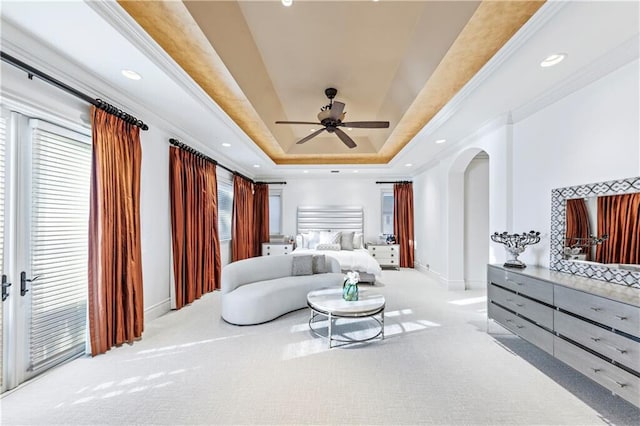 3131 NE 27th Ave, Lighthouse Point, FL 33064 - living area featuring a tray ceiling, carpet floors, baseboards, crown molding, and recessed lighting