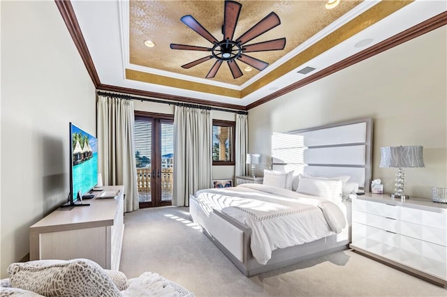 3131 NE 27th Ave, Lighthouse Point, FL 33064 - carpeted bedroom with crown molding, a raised ceiling, french doors, access to outside, and a ceiling fan