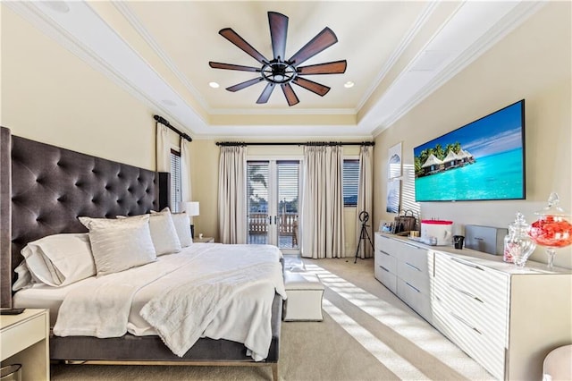 3131 NE 27th Ave, Lighthouse Point, FL 33064 - bedroom featuring a tray ceiling, crown molding, access to exterior, light carpet, and a ceiling fan