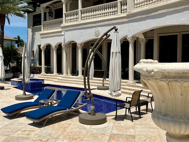 3131 NE 27th Ave, Lighthouse Point, FL 33064 - view of swimming pool featuring a patio and a pool with connected hot tub