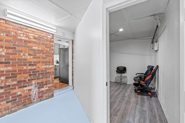 3700 N Australian Ave, West Palm Beach, FL 33407 - corridor with baseboards, a paneled ceiling, light wood-type flooring, and recessed lighting