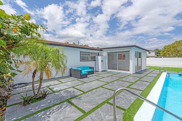 3700 N Australian Ave, West Palm Beach, FL 33407 - rear view of house featuring a patio area and fence