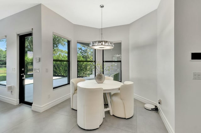 dining room featuring baseboards