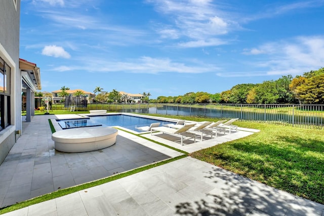 view of pool with a trampoline, a patio area, a fenced backyard, a water view, and a yard