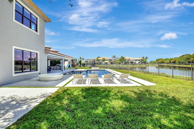 view of pool featuring a water view, a yard, a fenced backyard, a patio, and a fenced in pool