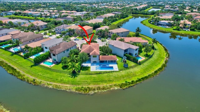 aerial view with a water view and a residential view