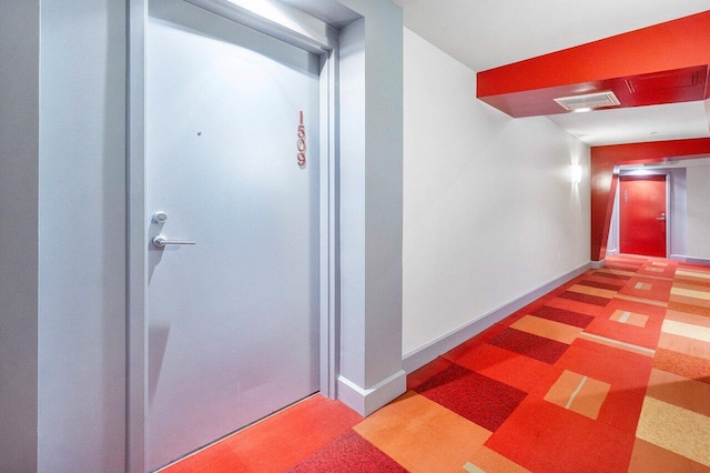 1551 N Flagler Dr Unit 1509, West Palm Beach, FL 33401 - hallway featuring visible vents and baseboards