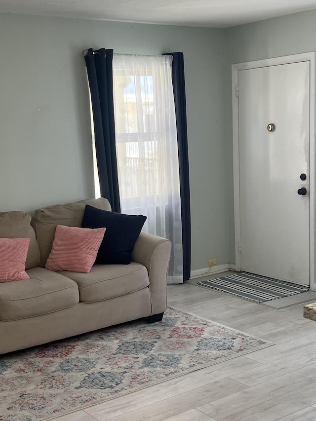 living room with wood finished floors