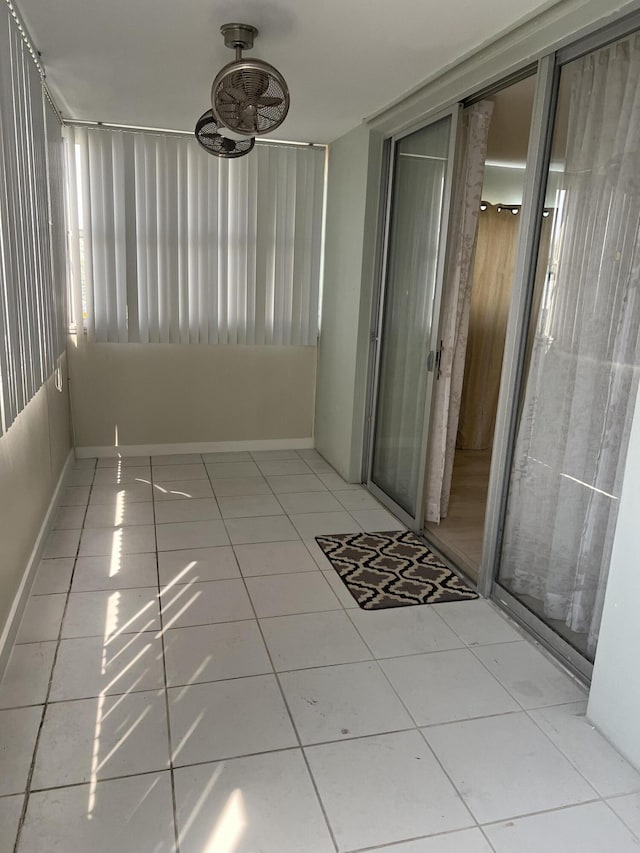 tiled spare room with baseboards