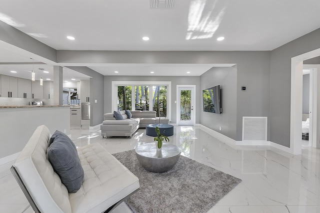 1900 NE 16th Ter, Fort Lauderdale, FL 33305 - living room with visible vents, recessed lighting, and marble finish floor
