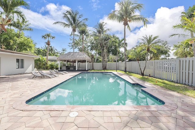 1900 NE 16th Ter, Fort Lauderdale, FL 33305 - view of pool featuring a fenced in pool, a gazebo, a patio area, and a fenced backyard