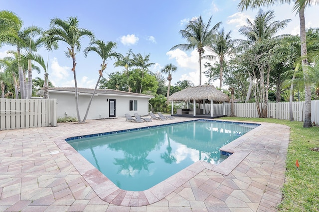 1900 NE 16th Ter, Fort Lauderdale, FL 33305 - view of swimming pool with a fenced backyard, a gazebo, a fenced in pool, and a patio