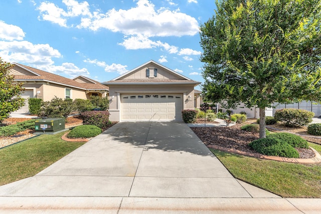 7753 SW 86th Loop, Ocala, FL 34476 - view of front of property featuring driveway, a garage, and stucco siding