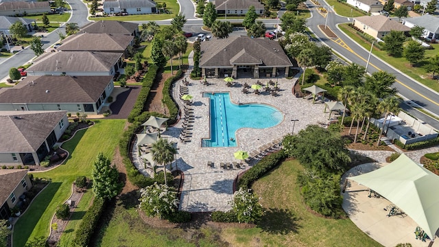 7753 SW 86th Loop, Ocala, FL 34476 - aerial view of property's location with nearby suburban area and a pool area