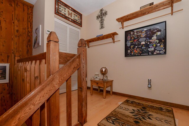stairs with wood finished floors