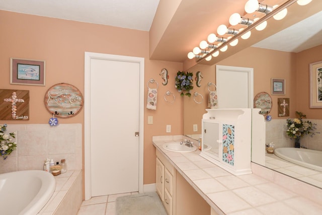 full bath with a garden tub, tile patterned flooring, and vanity