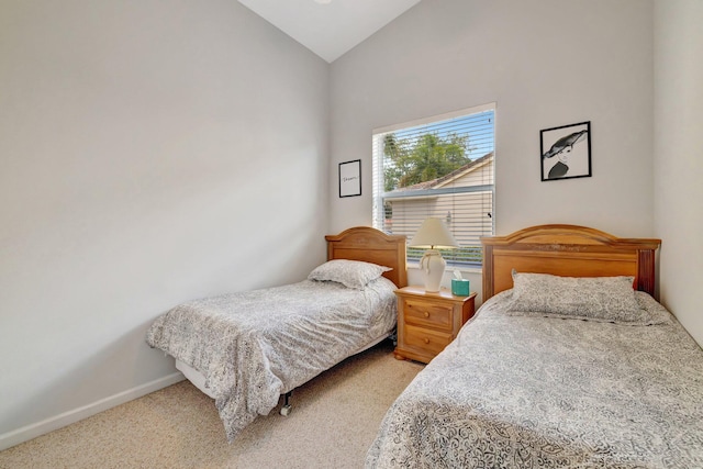 9225 Wentworth Ln, Port Saint Lucie, FL 34986 - bedroom featuring baseboards, light colored carpet, and lofted ceiling