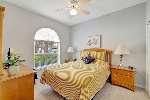 9225 Wentworth Ln, Port Saint Lucie, FL 34986 - bedroom featuring baseboards, ceiling fan, and light carpet