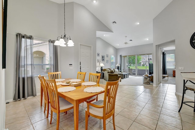 9225 Wentworth Ln, Port Saint Lucie, FL 34986 - dining room featuring visible vents, light tile patterned floors, recessed lighting, ceiling fan with notable chandelier, and high vaulted ceiling