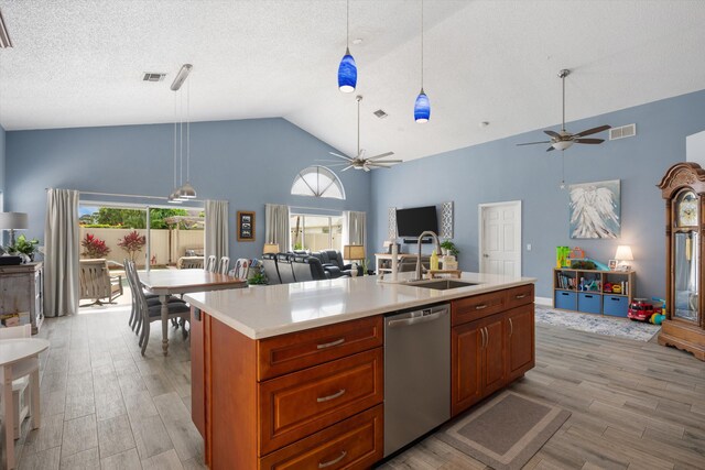1103 Aviary Rd, Wellington, FL 33414 - kitchen with open floor plan, stainless steel dishwasher, high vaulted ceiling, and a ceiling fan
