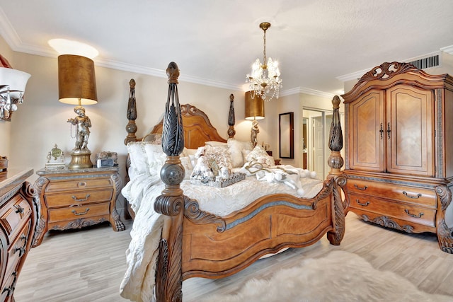 5749 Gemstone Ct Unit 107, Boynton Beach, FL 33437 - bedroom with a closet, light wood-style floors, a chandelier, ornamental molding, and visible vents