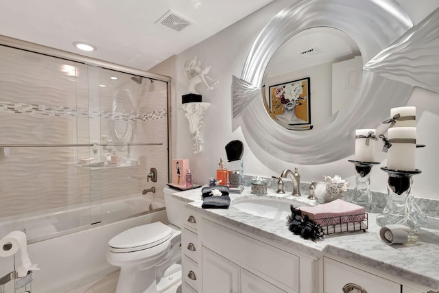 5749 Gemstone Ct Unit 107, Boynton Beach, FL 33437 - full bath featuring visible vents, toilet, bath / shower combo with glass door, and vanity