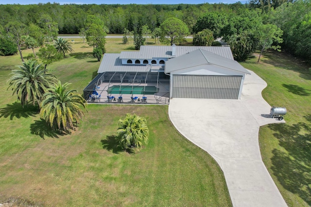 3120 SE Downwinds Rd, Jupiter, FL 33478 - drone / aerial view featuring a forest view