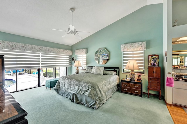 3120 SE Downwinds Rd, Jupiter, FL 33478 - bedroom featuring a ceiling fan, high vaulted ceiling, and access to outside