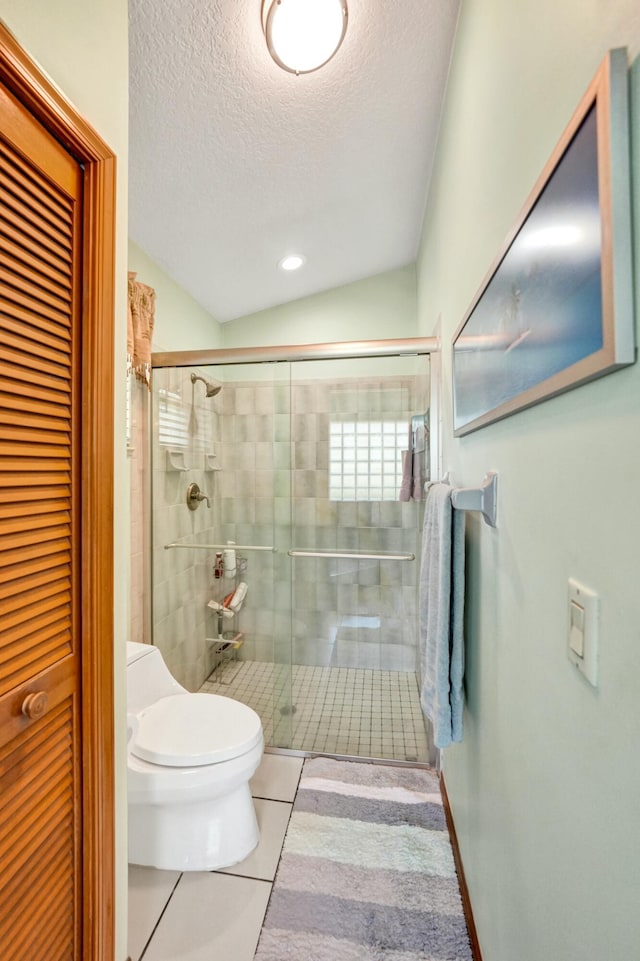 3120 SE Downwinds Rd, Jupiter, FL 33478 - bathroom featuring recessed lighting, a shower stall, tile patterned floors, toilet, and a textured ceiling