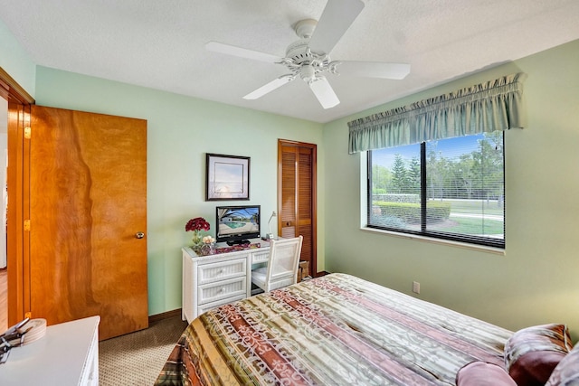 3120 SE Downwinds Rd, Jupiter, FL 33478 - bedroom with a closet, ceiling fan, carpet floors, and baseboards