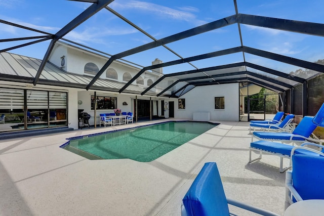 3120 SE Downwinds Rd, Jupiter, FL 33478 - pool with a patio and glass enclosure