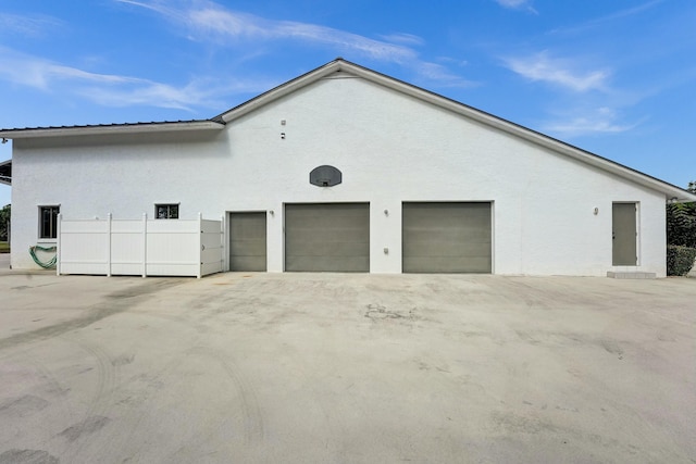 3120 SE Downwinds Rd, Jupiter, FL 33478 - view of outdoor structure with a garage