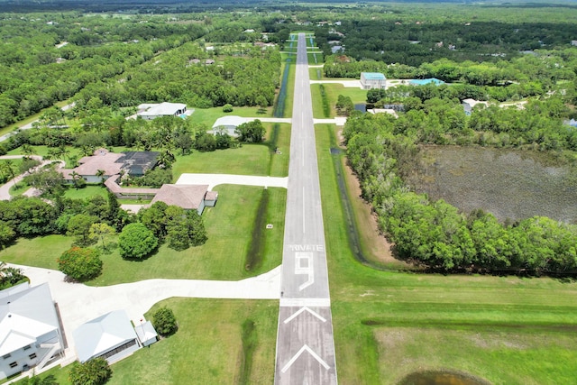 3120 SE Downwinds Rd, Jupiter, FL 33478 - birds eye view of property with a wooded view