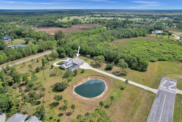 3120 SE Downwinds Rd, Jupiter, FL 33478 - drone / aerial view with a forest view and a water view