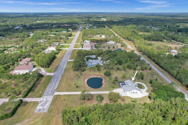 3120 SE Downwinds Rd, Jupiter, FL 33478 - bird's eye view featuring a view of trees