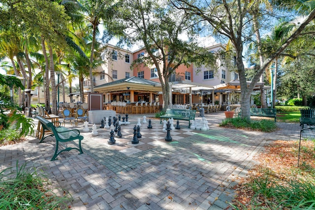 surrounding community with a patio